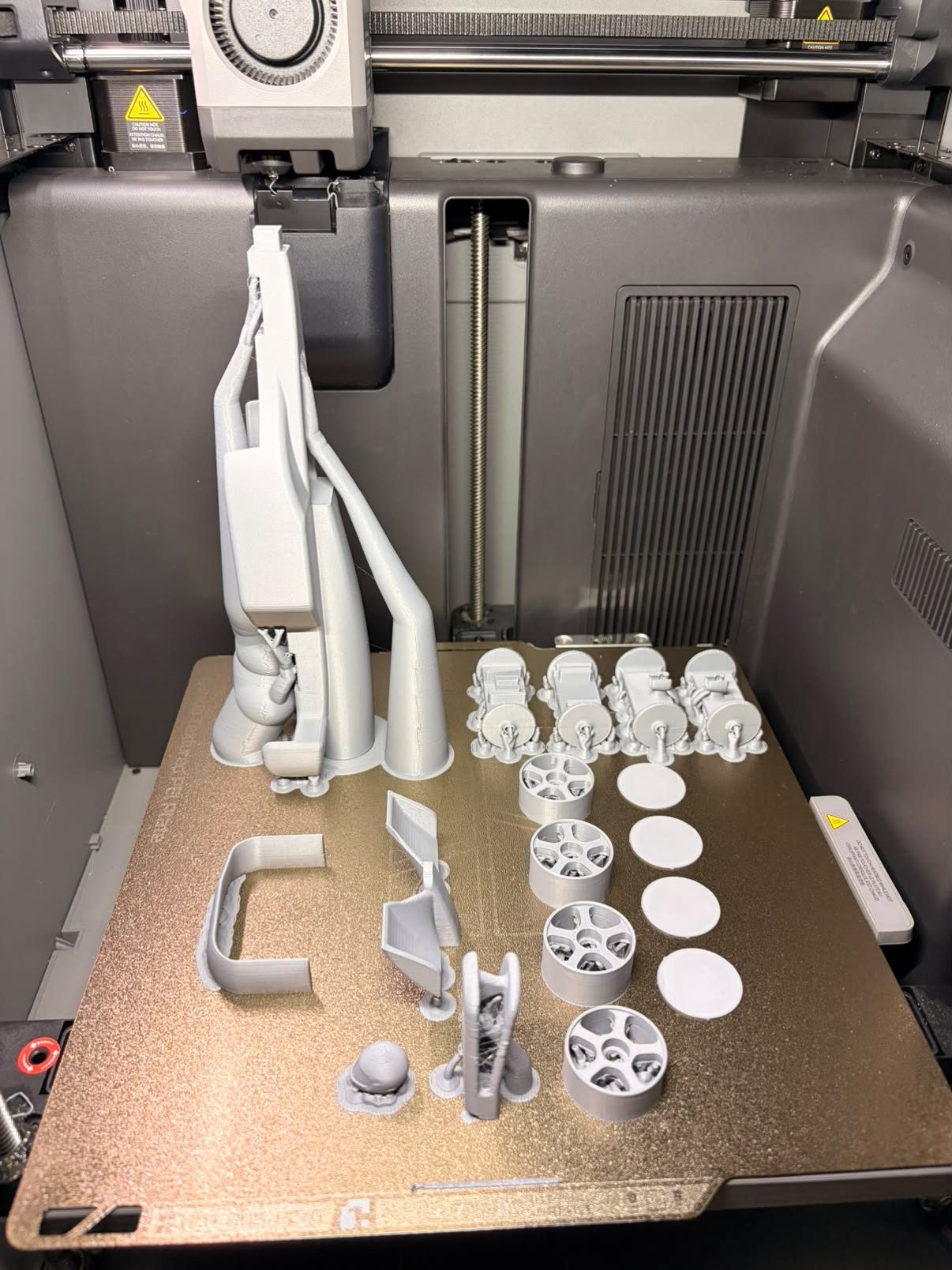 Prototype parts on the print bed
